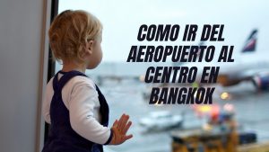 niña a la llegada del aeropuerto en bangkok mirando los aviones